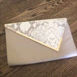 Snakeskin envelope clutch